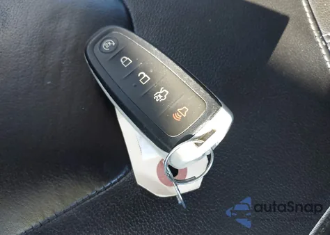 2015 Ford Focus Titanium z USA, uszkodzony, nr VIN 1FADP3N21FL228479